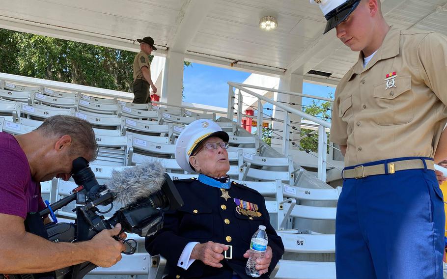 Retired Marine Hershel "Woody" Williams, left, speaks with his great-grandson Pfc. Cedar Ross, left, at Parris Island, S.C., where Ross graduated from Marine boot camp Friday, June 18, 2021. Williams, 97, is a veteran of the Battle of Iwo Jima, and the last living recipient of the Medal of Honor from World War II.