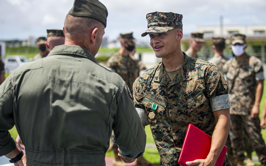 Cpl. Dominick Bonner received the Navy and Marine Corps Commendation Medal at Marine Corps Air Station Futenma, Okinawa, June 8, 2021. Bonner, a chemical, biological, radiological and nuclear defense specialist with the 1st Marine Aircraft Wing, helped save a restaurant worker's life earlier this spring. 