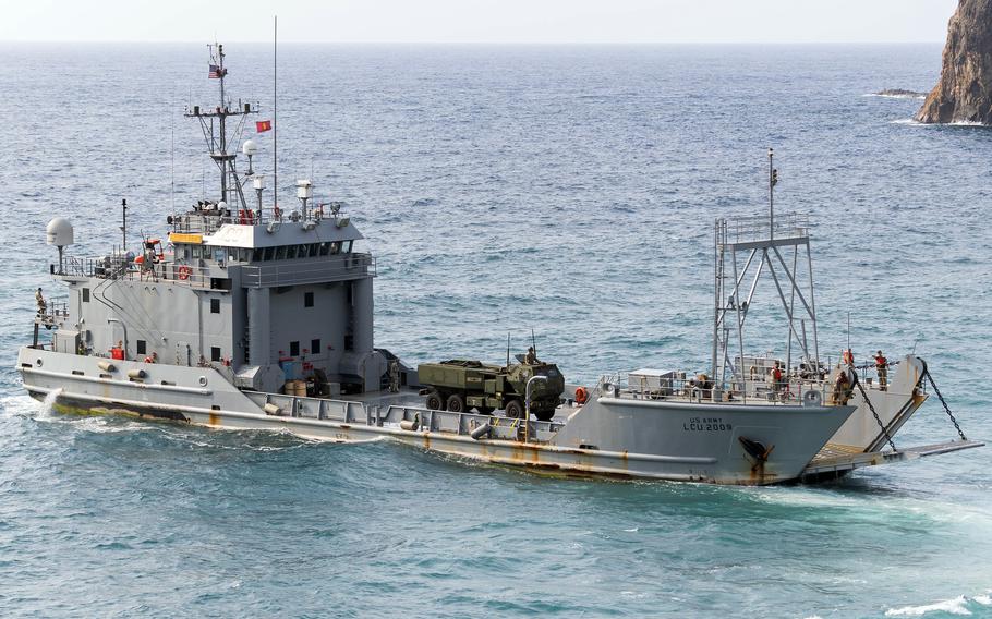 The USAV Calaboza transports a High Mobility Artillery Rocket System, or HIMARS, during Balikatan training in the Philippines, April 23, 2023.