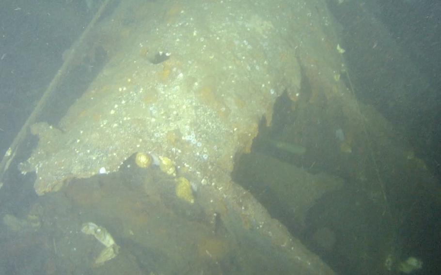 A screenshot of the wreck site of the USS Albacore, which was lost at sea Nov. 7, 1944. Indications of documented modifications made to Albacore prior to her final patrol such as the presence of an SJ Radar dish and mast, a row of vent holes along the top of the superstructure, and the absence of steel plates along the upper edge of the fairwater allowed Naval History and Heritage Command to confirm the wreck site finding as the Albacore. The screenshot was captured from video courtesy of Tamaki Ura from the University of Tokyo.