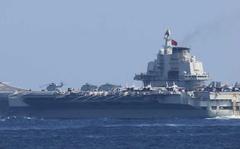 The Chinese aircraft carrier Liaoning sails near Okinawa, Dec. 19, 2021. 