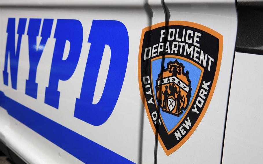 The side of a police patrol car in New York City. 