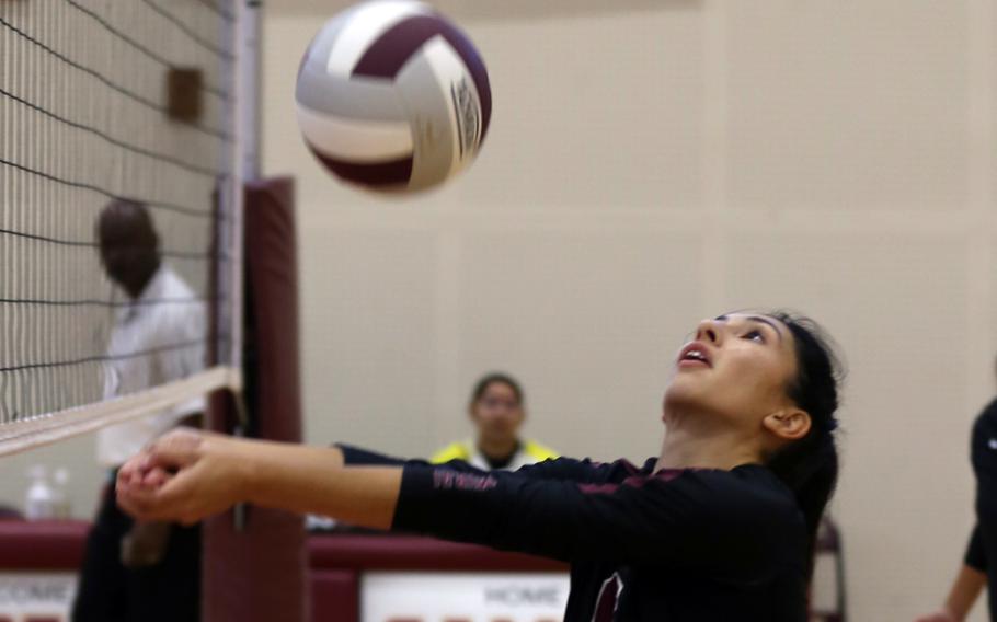 Matthew C. Perry’s Chelsea Campbell bumps the ball against Zama during Friday’s DODEA-Japan girls volleyball match. The Trojans won in three sets.