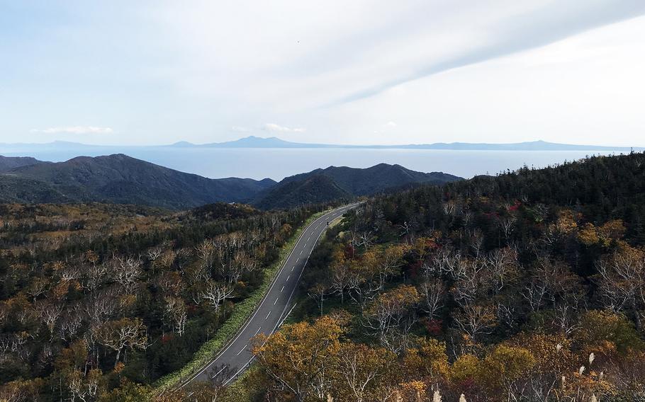 Russia-controlled Kunashiri Island is seen in the distance from the Shiretoko Peninsula on Hokkaido, Japan, in October 2018.