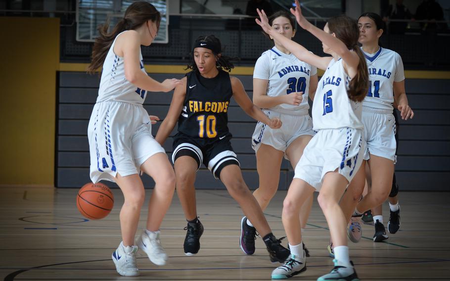 Bahrain’s Dalisa Lewis outdribbles four defenders from the Rota Admirals during the DODEA-Europe Division II girls basketball tournament at Ramstein Air Base, Germany, Feb. 15, 2023. Despite Bahrain’s efforts, Rota eeked out a narrow win 34-32 against the Falcons.