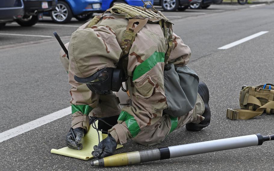 A U.S. Air Force explosive ordnance disposal technician assigned to the 786th Civil Engineer Squadron examines unexploded ordnance during a training scenario at Ramstein Air Base, Germany, May 20, 2021. The base will be conducting a routine emergency management exercise Tuesday and Wednesday which may result in loud noises, officials said.