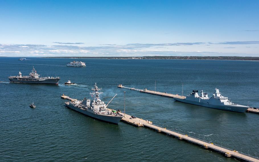From left, the USS Mount Whitney, the destroyer USS Paul Ignatius and the Danish navy frigate HDMS Peter Willemoes depart from Tallinn, Estonia, on June 4, 2023, to participate in the BALTOPS exercise. 