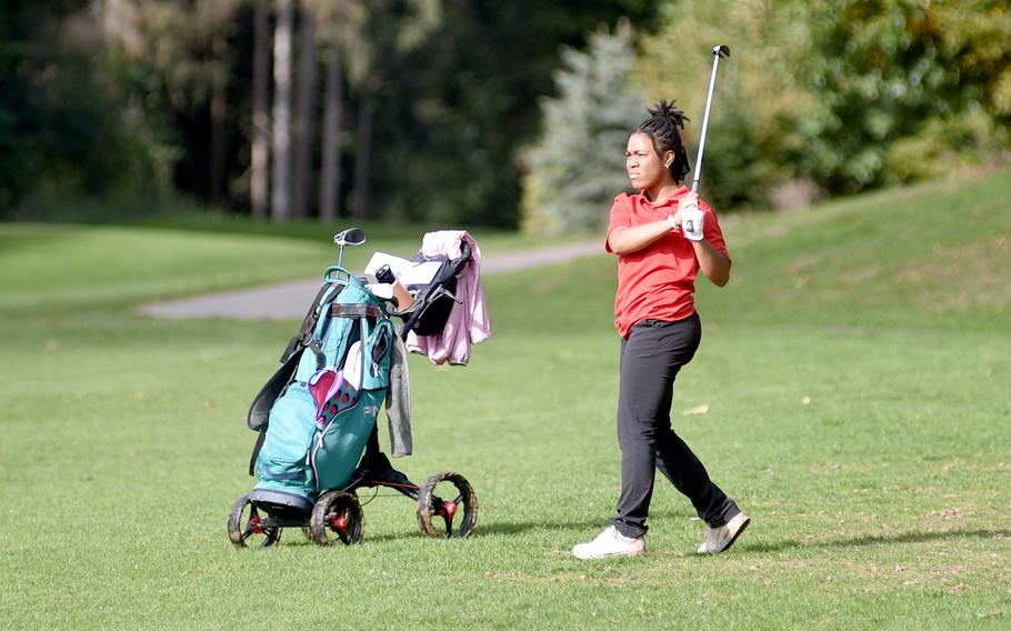 Kaiserslautern’s Asia Andrews watches her shot on the fairway at the No. 6 hole Thursday during the DODEA European golf championships at the Rheinblick Golf Course in Wiesbaden, Germany. The sophomore won the individual crown.