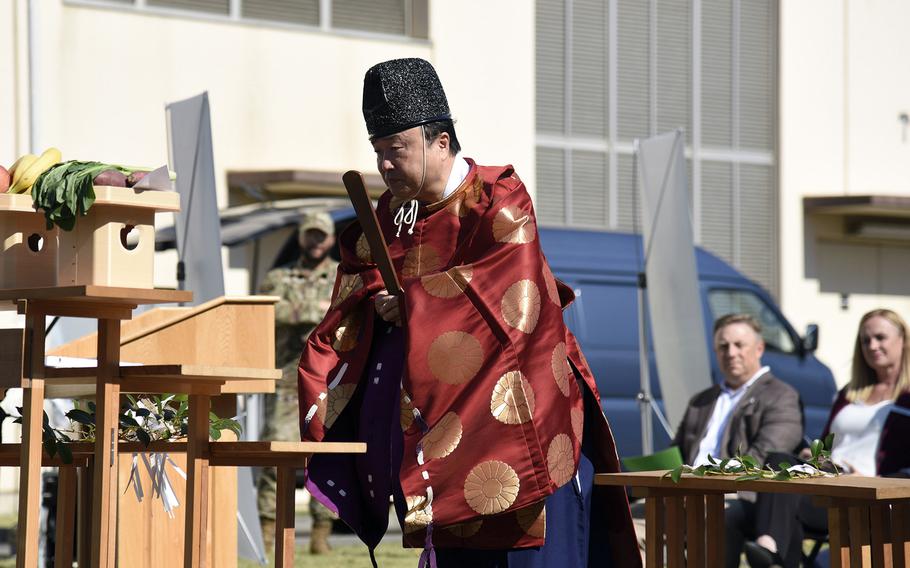 A Shinto priest from nearby Kumagawa Shrine begins the dedication ceremony for a combined heat and power plant at Yokota Air Base, Japan, Friday, Nov. 3, 2023.