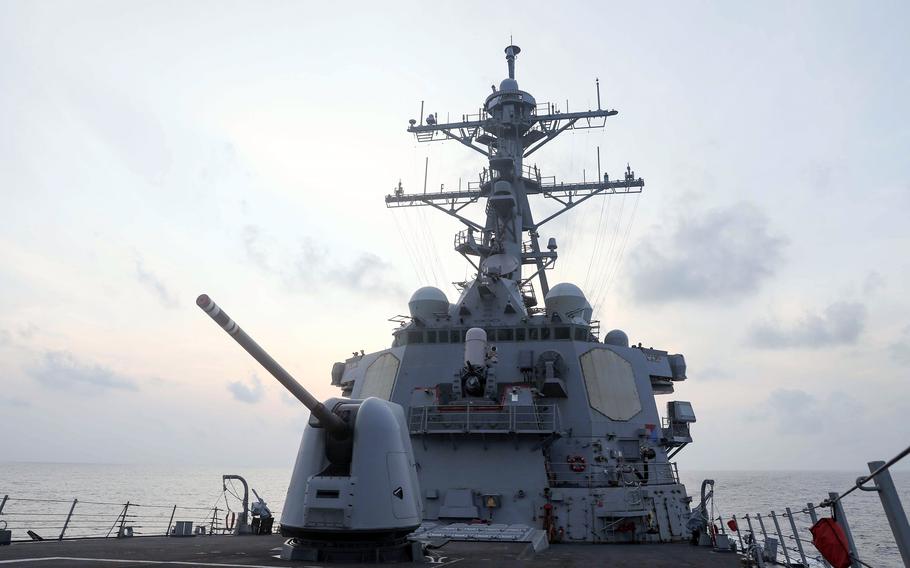 The guided-missile destroyer USS Milius carries out a freedom-of-navigation operation near the Spratly Islands in the South China Sea, Monday, April 10, 2023.