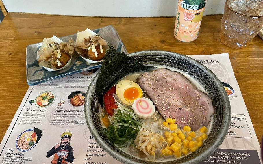 A bowl of miso ramen and a takoyaki appetizer at Mic Ramen in Pordenone, Italy, about 20 minutes from Aviano Air Base.
