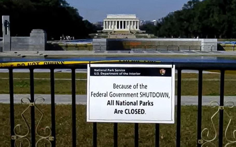 A video screen grab shows a sign announcing a Federal Government Shutdown hanging on a gate blocking off the World War II Memorial in Washington, D.C., on Oct. 1, 2013.