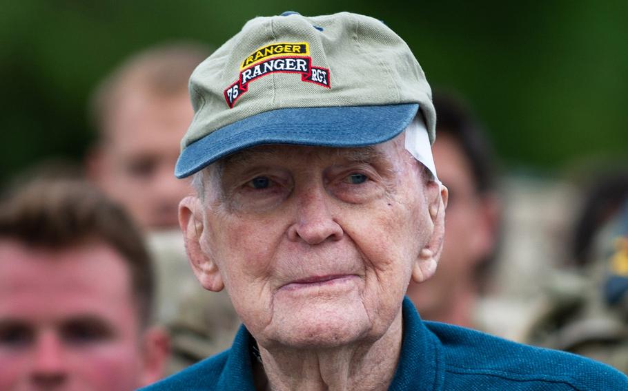 Retired Army Col. Ralph Puckett stands alongside troops as they prepare to start a foot march during the 2021 David E. Grange Jr. Best Ranger Competition at Fort Moore, Ga., on April 16, 2021.