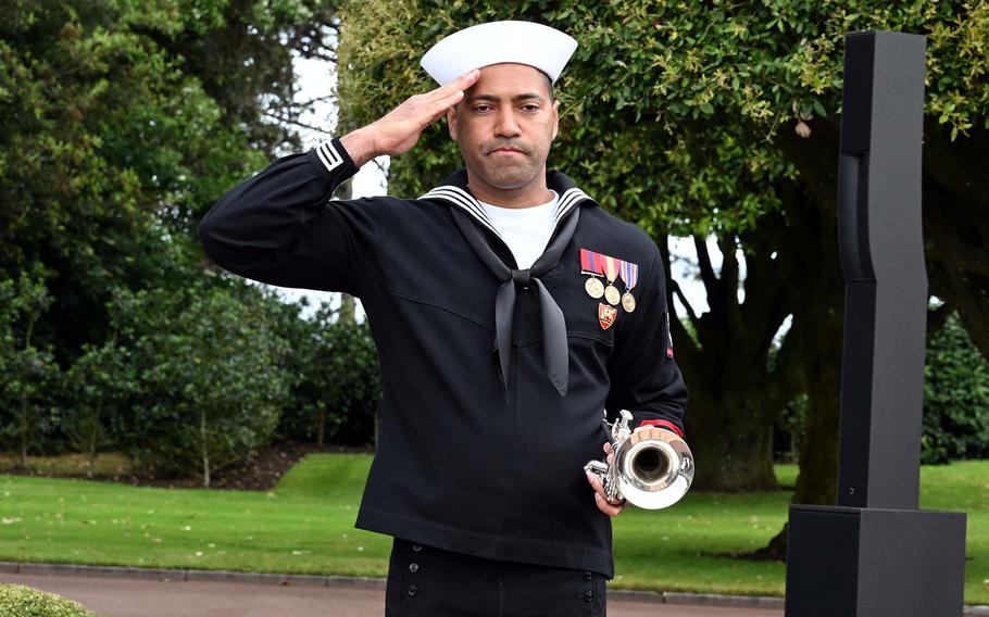 A sailor salutes.