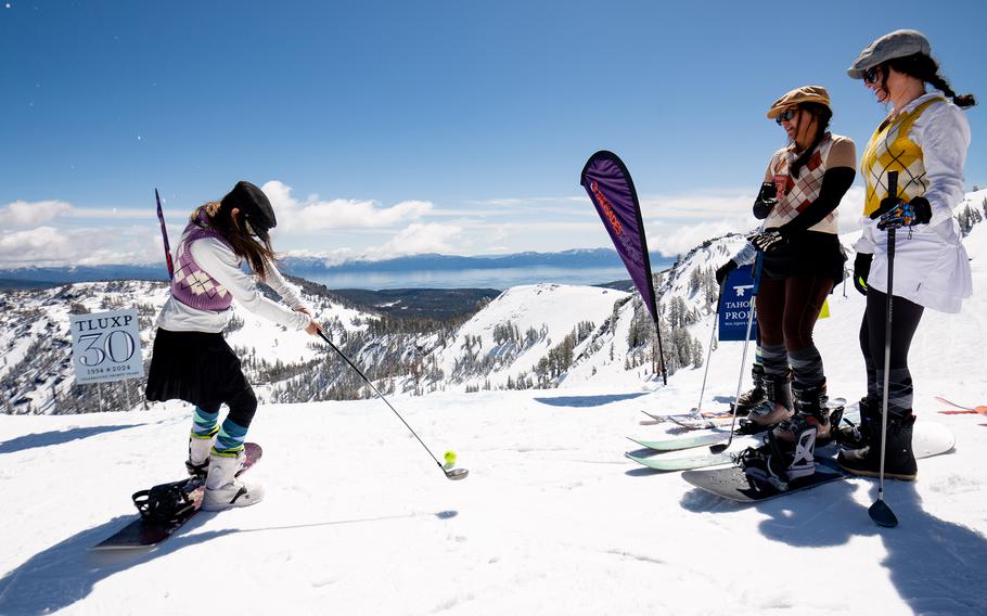 Skiers snow golfing at the Palisades Tahoe resort. 