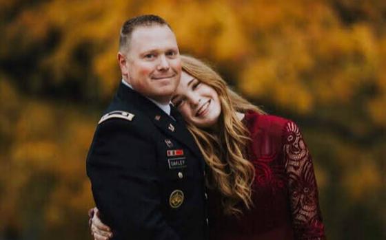 Genevieve Oakley poses with her dad, retired Lt. Col. Tom Oakley. 