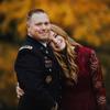 Genevieve Oakley poses with her dad, retired Lt. Col. Tom Oakley. 