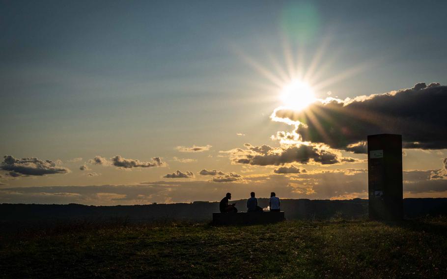 Visitors enjoy the panoramic views from the polygon plateau Aug. 27, 2023, in Ensdorf, Germany. The hilltop offers views of the surrounding Saarland.