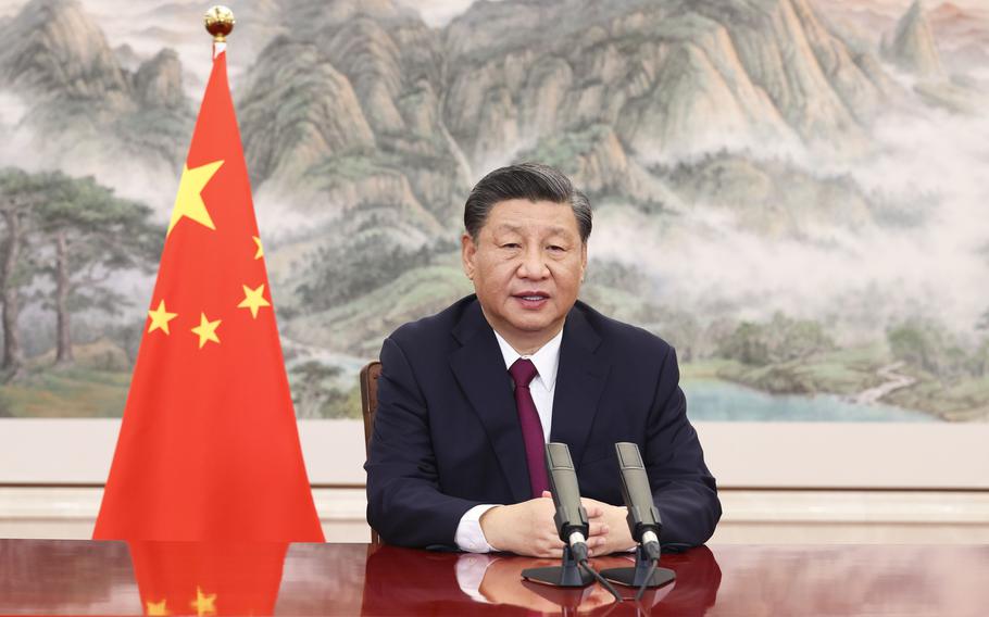 In this photo released by China's Xinhua News Agency, Chinese president Xi Jinping delivers a speech via video link to the opening ceremony of the Bo'ao Forum For Asia in Bo'ao in southern China's Hainan Province, Thursday, April 21, 2022. Xi said his government supports talks to resolve international disputes, but opposes the use of sanctions.