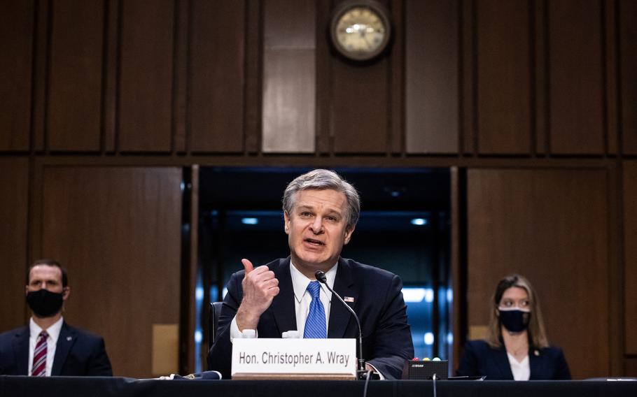 FBI Director Christopher Wray, shown at a hearing on Capitol Hill, has said the bureau opens a new investigation on China every 10 hours. 