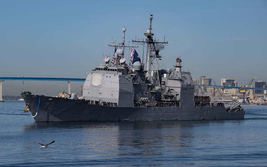 A ship sails in the water.