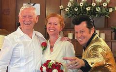 James Mattis, former Marine Corps general and U.S. Defense Secretary, with Christina Lomasney and an Elvis impersonator who reportedly married the couple in Las Vegas, on June 25, 2022.