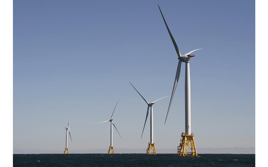 Wind turbines, of the Block Island Wind Farm, tower above the water on Oct. 14, 2016, off the shores of Block Island, Rhode Island.