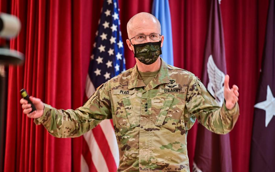 Lt. Gen. Ronald Place, director of the Defense Health Agency, speaks at a town hall meeting with staff and virtually Feb. 23, 2021, at Tripler Army Medical Center, Hawaii.