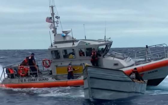 Coast Guard crews rescued 28 people from a struggling Cuban migrant vessel, some on the boat and some in the water, off Key West and were searching Tuesday for one missing passenger.