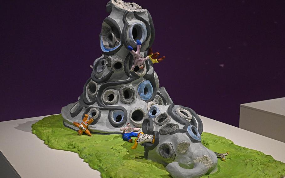 “The Falling Tower” on display at the Niki de Saint Phalle exhibit in Frankfurt, Germany, is a model for the Tarot Garden in Italy, which features giant works of art by the artist.