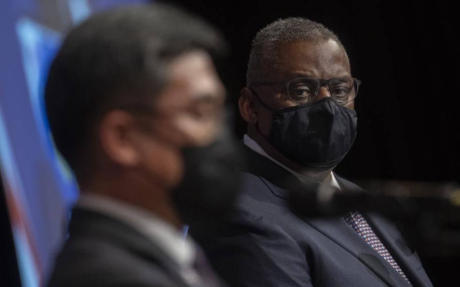 Secretary of Defense Lloyd Austin listens to Prime Minister Kim Boo-kyum during the Korea Defense Veterans Association reception in Seoul, South Korea, Wednesday, Dec. 1, 2021.