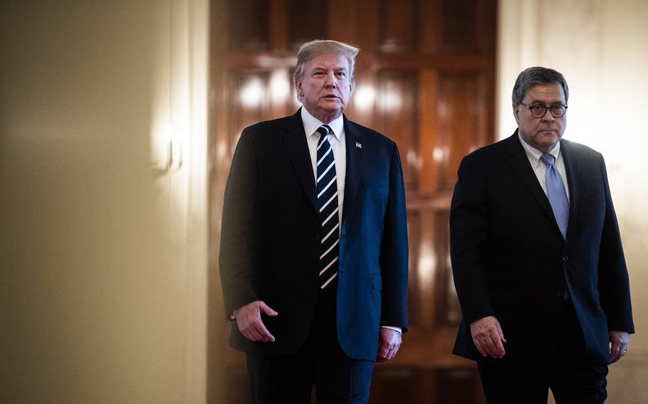 Then-President Donald Trump and then-Attorney General William Barr are seen in 2019.