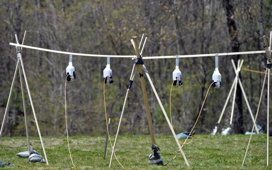 Jugs of gasoline and detonators moments before they were ignited during joint FBI and Westover post blast investigative training at the Air Reserve Base in Chicopee, Mass.