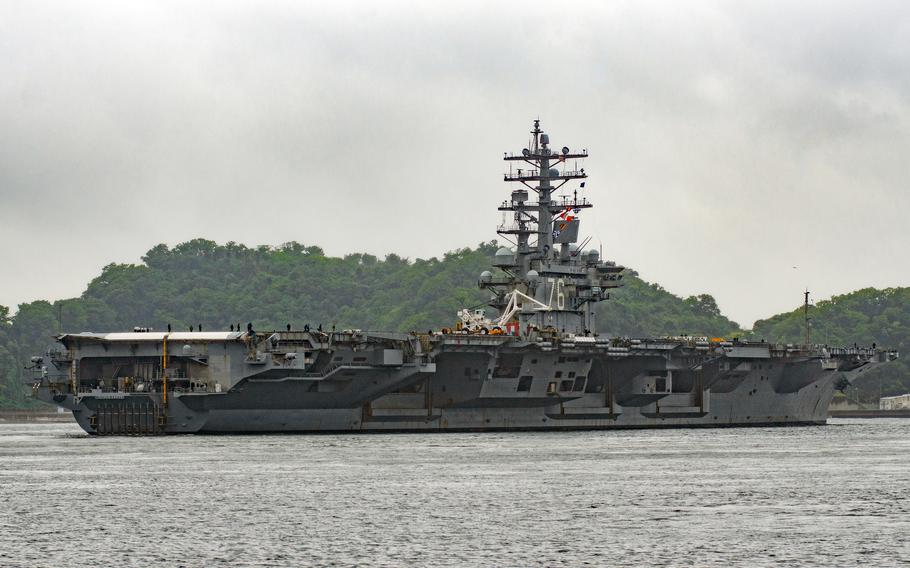 The aircraft carrier USS Ronald Reagan heads out on patrol from Yokosuka Naval Base, Japan, Tuesday, May 23, 2023.