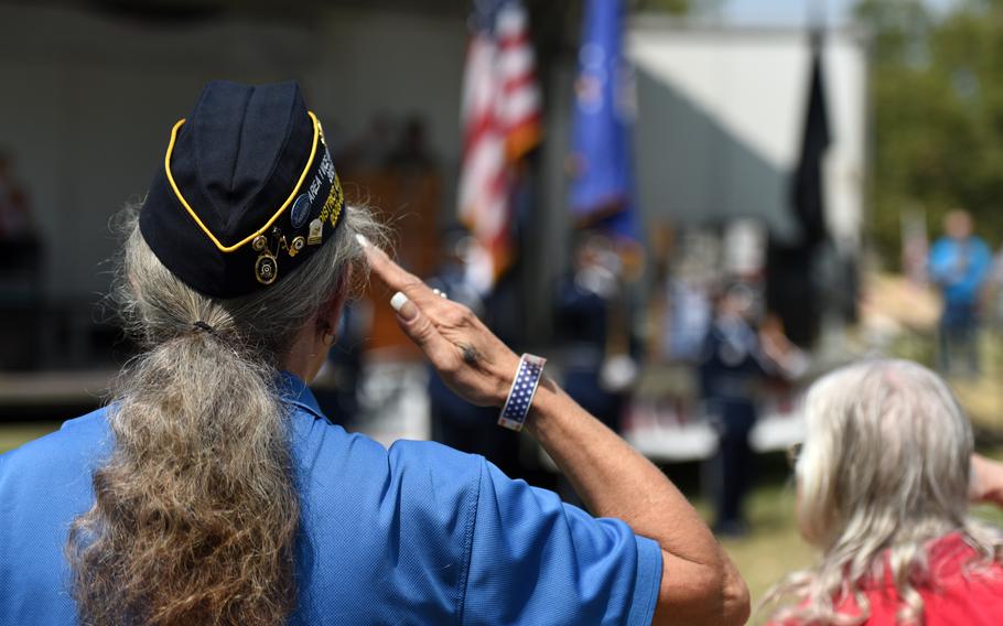 Cynthia Verrill, Linda American Legion Post 807 commander, salutes the flag during the playing of the National Anthem during the Yuba-Sutter Stand Down in 2018, in Marysville, Calif. The stand down gave local veterans and their families the opportunity to seek services, such as dental, veteran benefits and Social Security, at one location. 