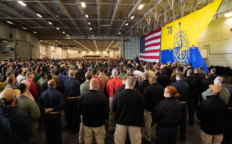 Secretary of the Navy Carlos Del Toro addresses the crew of theUSS Gerald R. Ford (CVN 78) in the hangar bay during a visit to mark the completion of the ship’s eight-month maiden deployment, Jan. 15, 2024. 