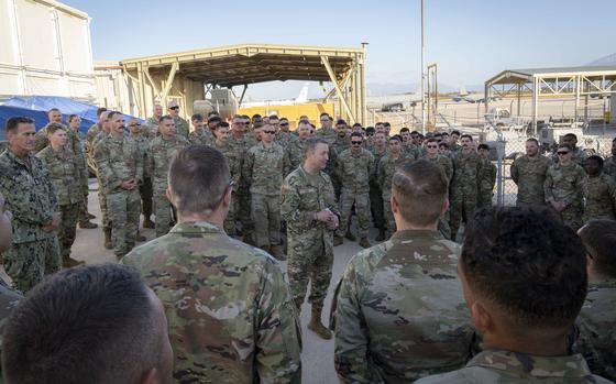 Air Force Gen. Dan Caine, chairman of the Joint Chiefs of Staff, talks to sailors at Naval Support Activity Souda Bay in Greece on Sunday.