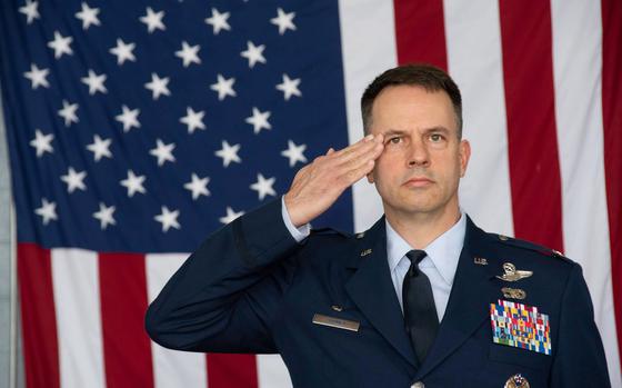 Col. Deane Thomey salutes after taking command of the 111th Attack Wing at Biddle Air National Guard Base in Horsham, Pa., June 13, 2021. 