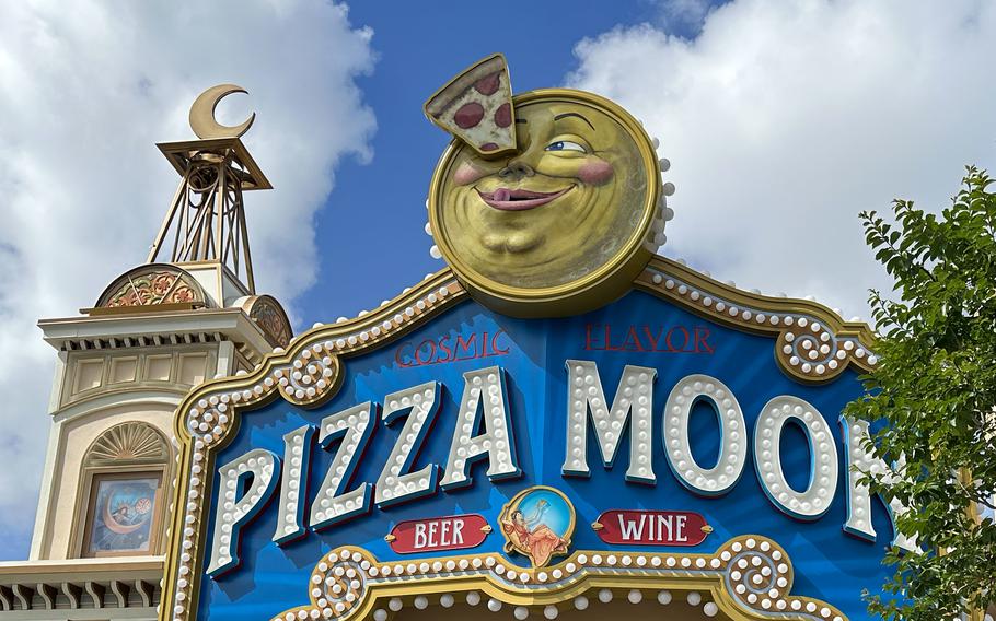 A view of the Pizza Moon sign at Universal Epic Universe.