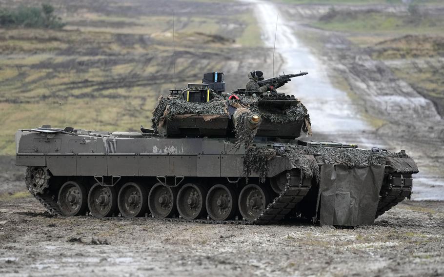 A Leopard 2 tank is seen in action during a visit of German Defense Minister Boris Pistorius at the Bundeswehr tank battalion 203 at the Field Marshal Rommel Barracks in Augustdorf, Germany, on Feb. 1, 2023. The German military has ordered 18 new Leopard 2 tanks to replace vehicles that were sent to Ukraine earlier this year, a leading defense company said Friday May 26, 2023. 