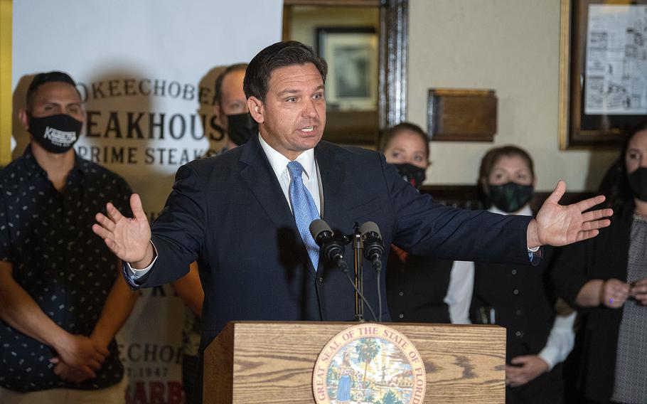 Florida Gov. Ron DeSantis speaks at a news conference on Dec. 15, 2020, in West Palm Beach, Florida.