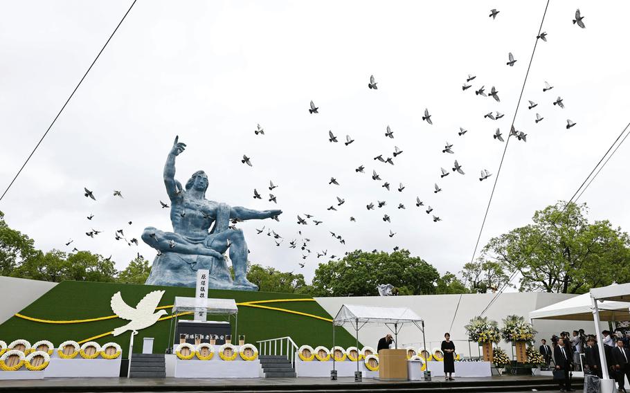 Doves are leased over the Peace Statue during a ceremony to mark the 80th anniversary of the U.S. atomic bombing at the Peace Park in Nagasaki, southern Japan Saturday, Aug. 9, 2025. 