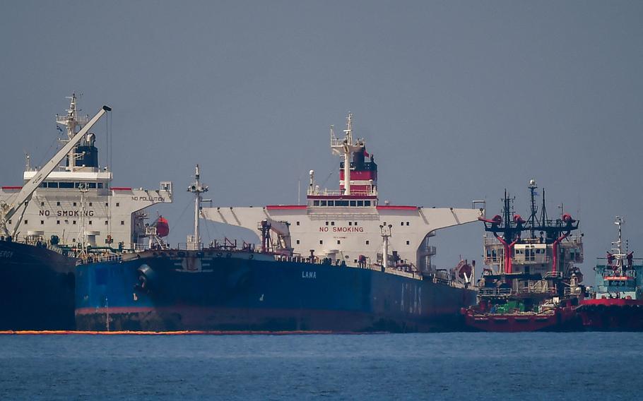 The Liberian-flagged oil tanker Ice Energy, left, transfers crude oil from the Russian-flagged oil tanker Lana off the shore of Karystos, Greece, on May 29, 2022.