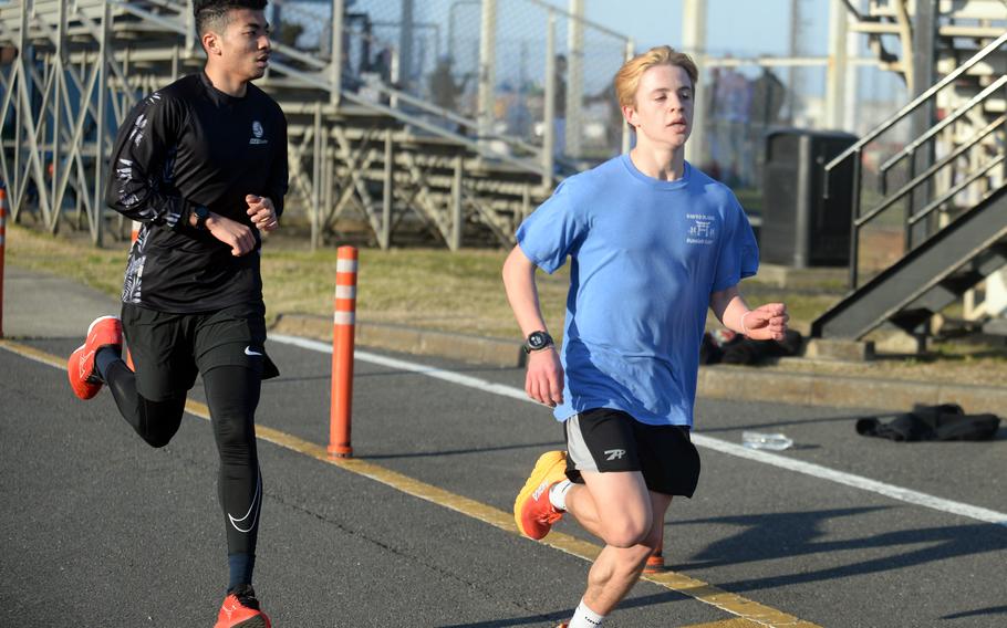 Junior Soul Vessels and freshman Maverick Kentz bring their cross country experience to Nile C. Kinnick’s track-and-field distance corps.