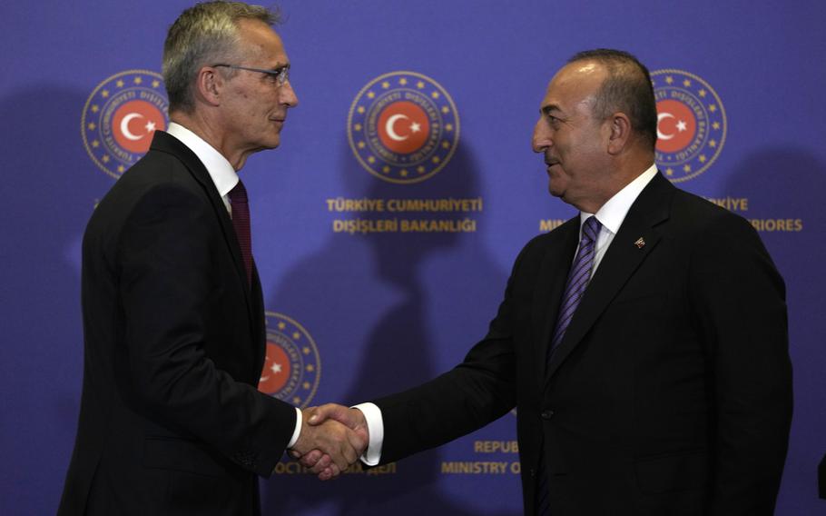 NATO Secretary General Jens Stoltenberg left, shakes hands with Turkish Foreign Minister Mevlut Cavusoglu following a press conferences in Istanbul, Thursday, Nov. 3, 2022.