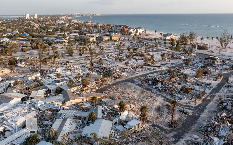 More than two months after Hurricane Ian's landfall, wreckage was abundant. An aerial view shows collapsed mobile homes in Fort Myers Beach on Dec. 4, 2022.