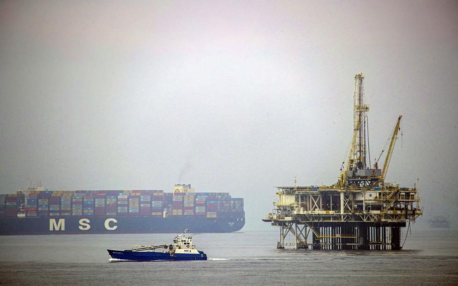 Recovery 1, an oil spill response vessel from the Marine Spill Response Corp., sails along the Orange County coast on Thursday, Oct. 7, 2021. 