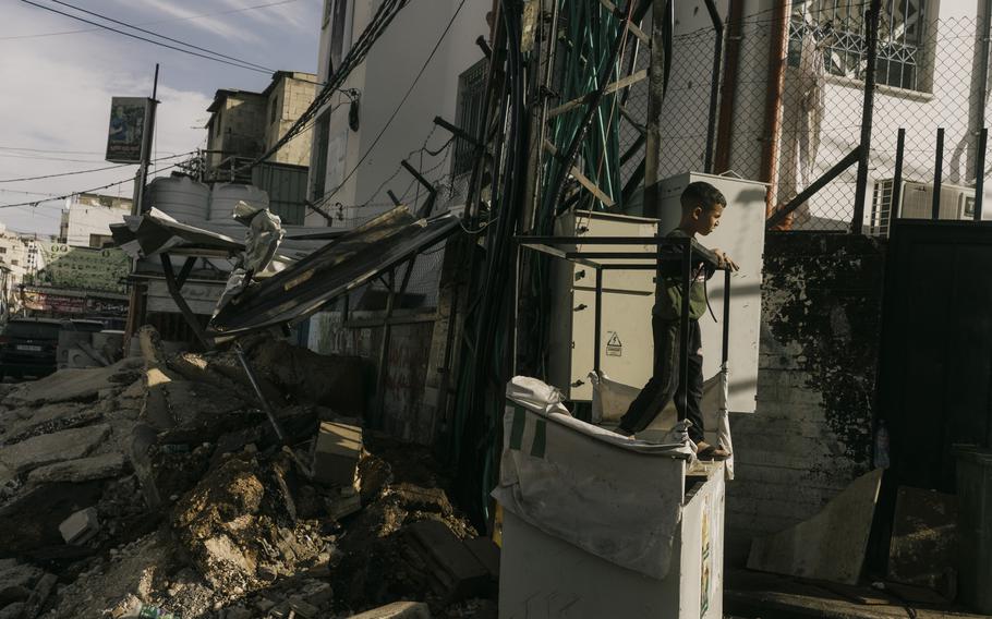 A destroyed building in the Jenin refugee camp in the West Bank on Friday, Nov. 10, 2023, a day after an Israeli army attack.