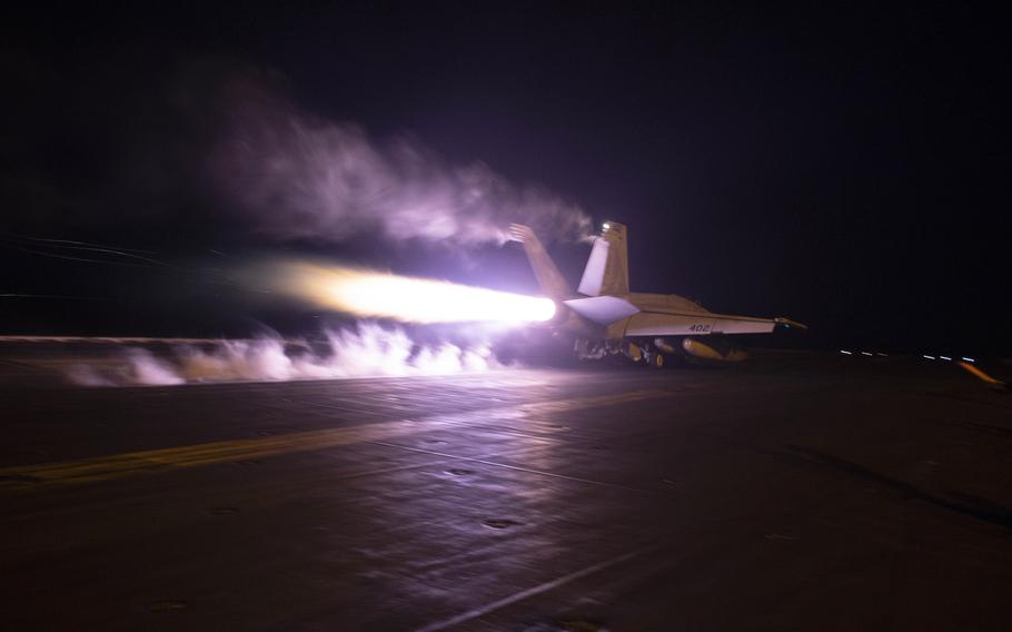 An aircraft launches from USS Dwight D. Eisenhower during flight operations in the Red Sea, Jan. 22, 2024. 