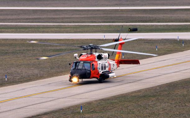 An MH-60T Jayhawk helicopter taxis on the runway at Air Station Traverse City, Michigan, April 13, 2017. Jayhawks are replacing the current helicopters the air station operates to provide improved search and rescue coverage in the area. (U.S. Coast Guard photo by Air Station Traverse City)